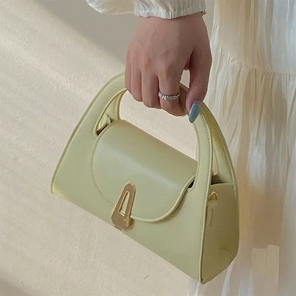 Niche high-end handbag women's new semi-round shoulder bag versatile commuter retro lock messenger bag tide