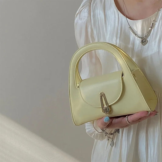 Niche high-end handbag women's new semi-round shoulder bag versatile commuter retro lock messenger bag tide