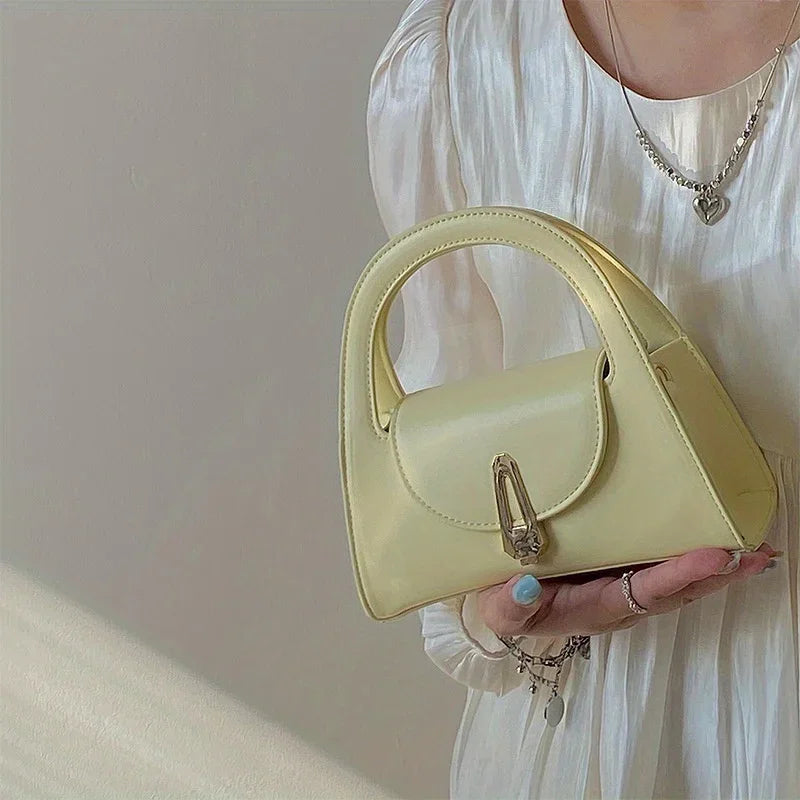 Niche high-end handbag women's new semi-round shoulder bag versatile commuter retro lock messenger bag tide