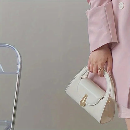 Niche high-end handbag women's new semi-round shoulder bag versatile commuter retro lock messenger bag tide