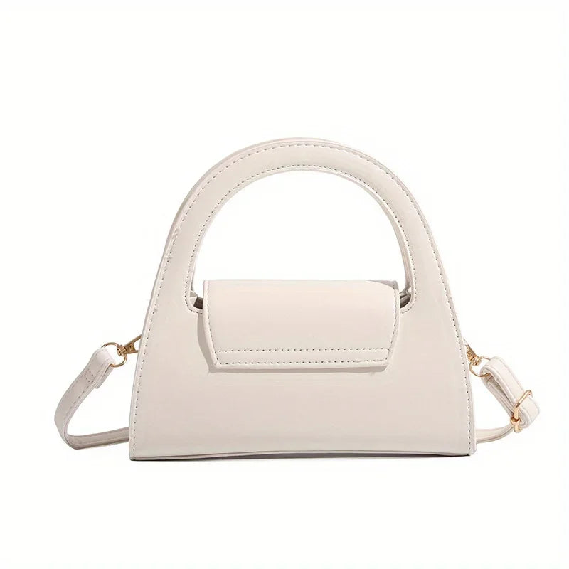 Niche high-end handbag women's new semi-round shoulder bag versatile commuter retro lock messenger bag tide