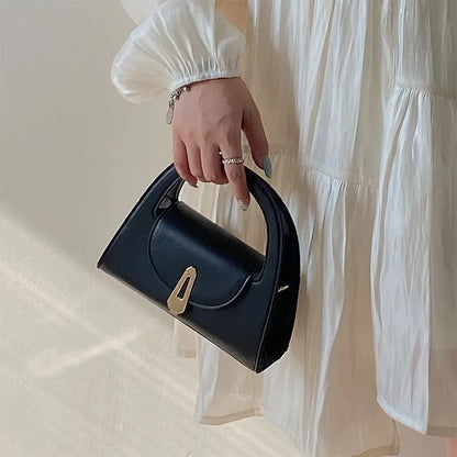 Niche high-end handbag women's new semi-round shoulder bag versatile commuter retro lock messenger bag tide