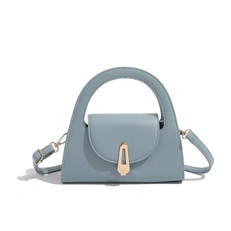 Niche high-end handbag women's new semi-round shoulder bag versatile commuter retro lock messenger bag tide